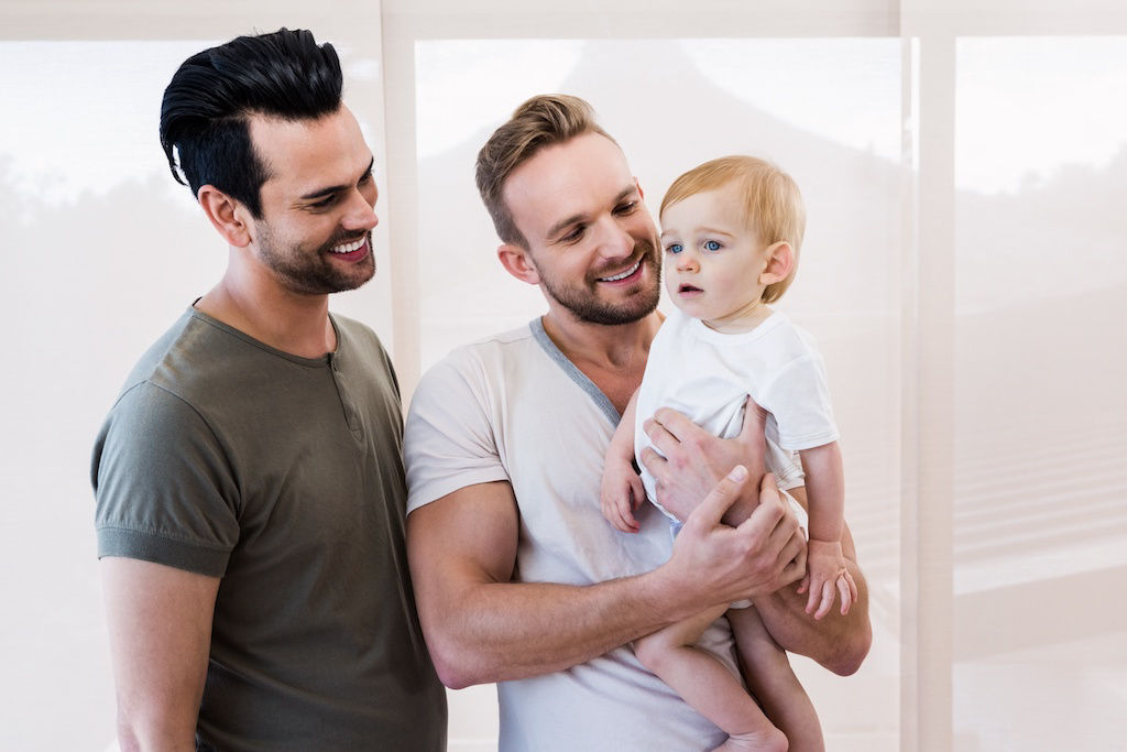 Gay couple with a child